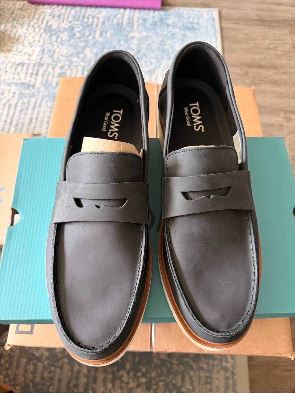 TOMS Men’s Black Leather Slip-On Penny Loafers with Tan Outsole